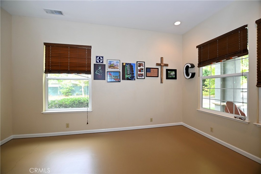 1422 Ridgebrook Way Chico, CA 95928 - Photo 8 of 25 a view of a livingroom with an empty space and a window
