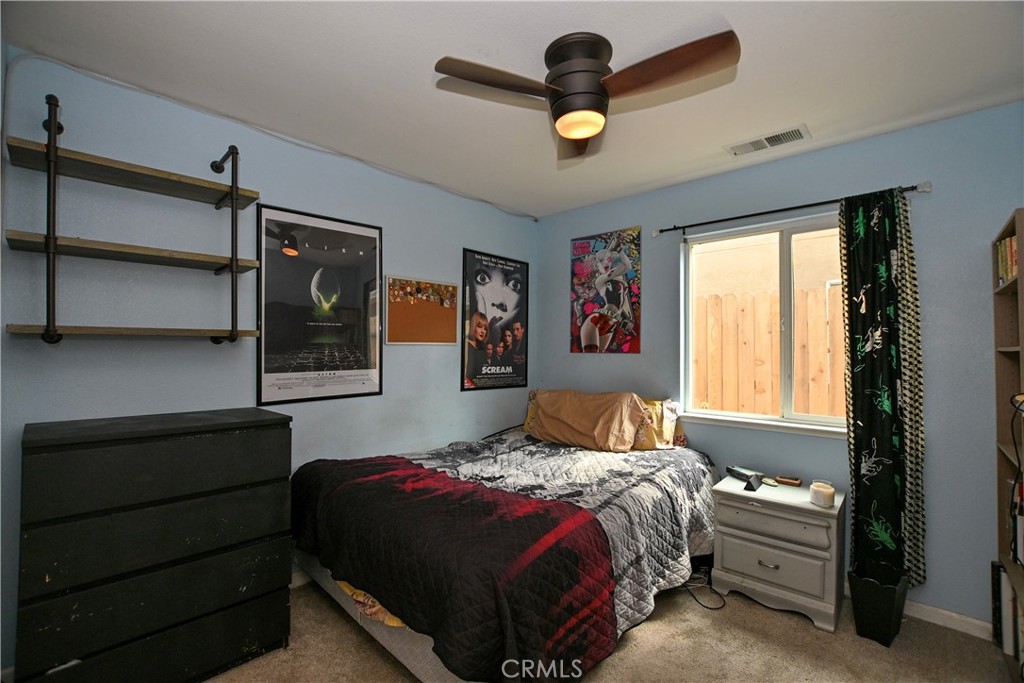 1422 Ridgebrook Way Chico, CA 95928 - Photo 9 of 25 a bedroom with a bed and a window