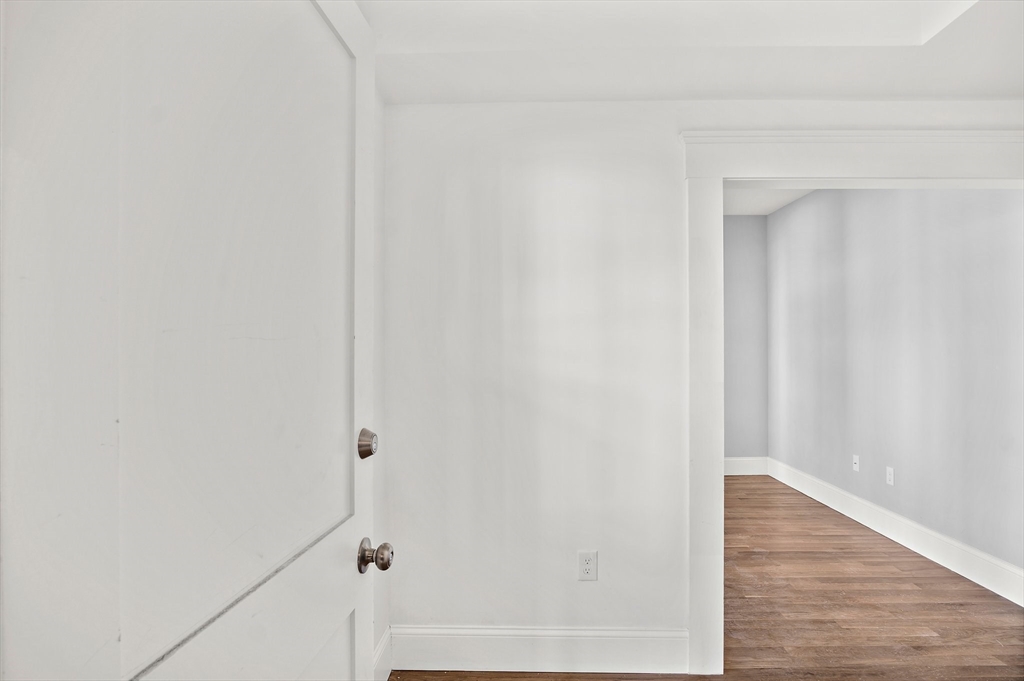 10 Sutton Street, Unit 3 Boston, MA 02126 - Photo 7 of 18 a view of a hallway