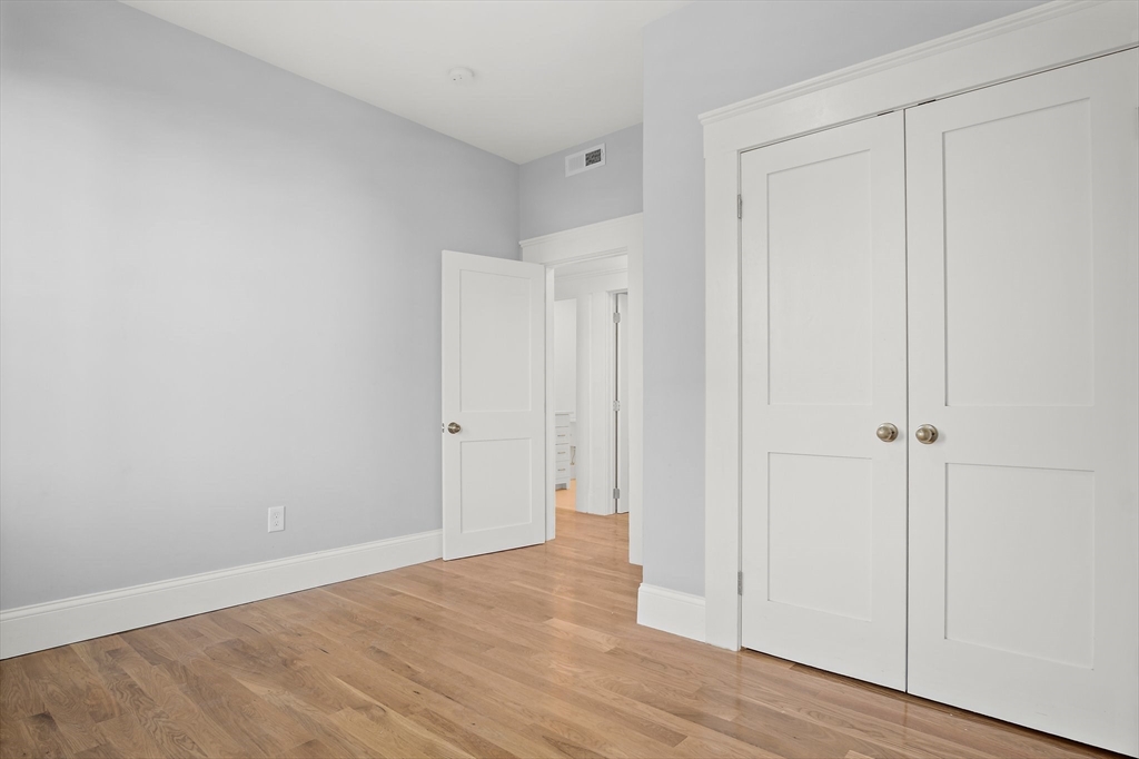 10 Sutton Street, Unit 3 Boston, MA 02126 - Photo 9 of 18 a view of an empty room