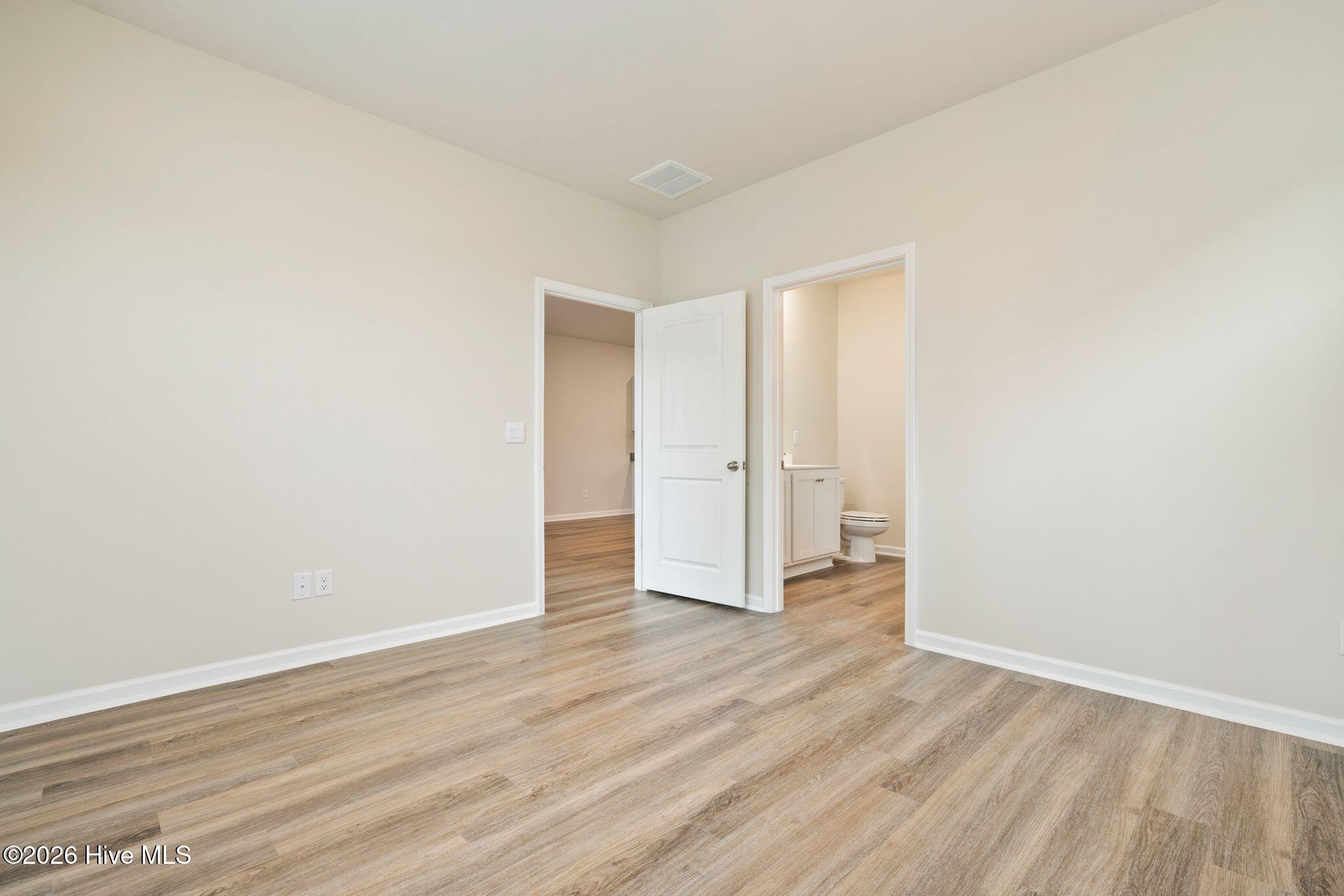 3583 Whaley Way Northwest Ash, NC 28420 - Photo 19 of 38 Master Bedroom