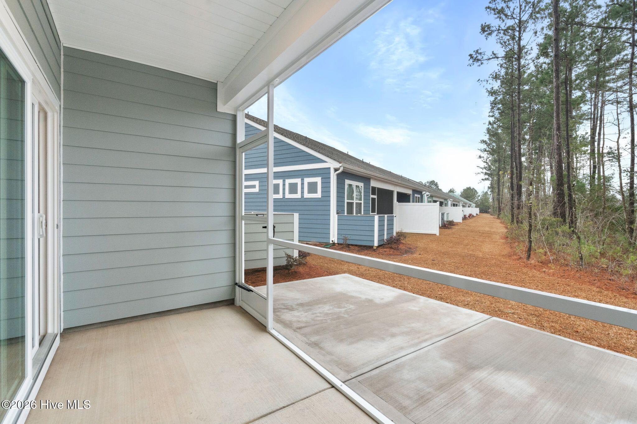 3583 Whaley Way Northwest Ash, NC 28420 - Photo 31 of 38 Porch/Patio