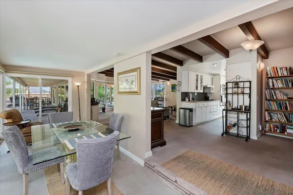 a work room with large windows