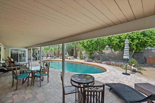 a view of a house with swimming pool