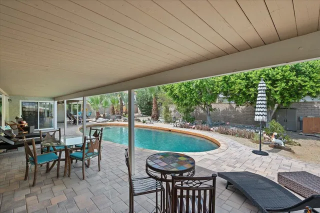 a view of a house with swimming pool