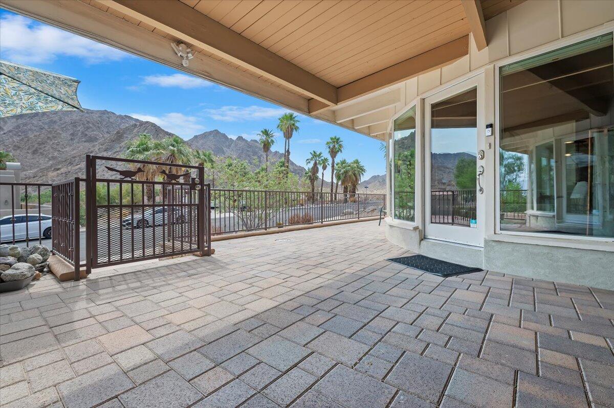 54925 Avenida Ramirez La Quinta, CA 92253 - Photo 8 of 50 a view of a house with a porch