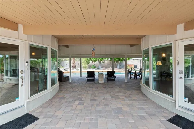 a view of a building with floor to ceiling window and floor to ceiling window