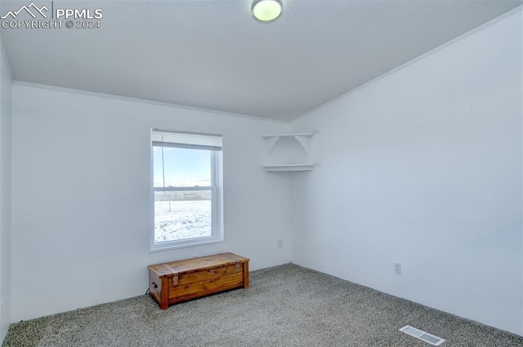 7270 South Yoder Road Yoder, CO 80864 - Photo 18 of 37 a view of room with window