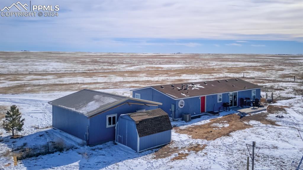7270 South Yoder Road Yoder, CO 80864 - Photo 21 of 37 a view of a room with an ocean view