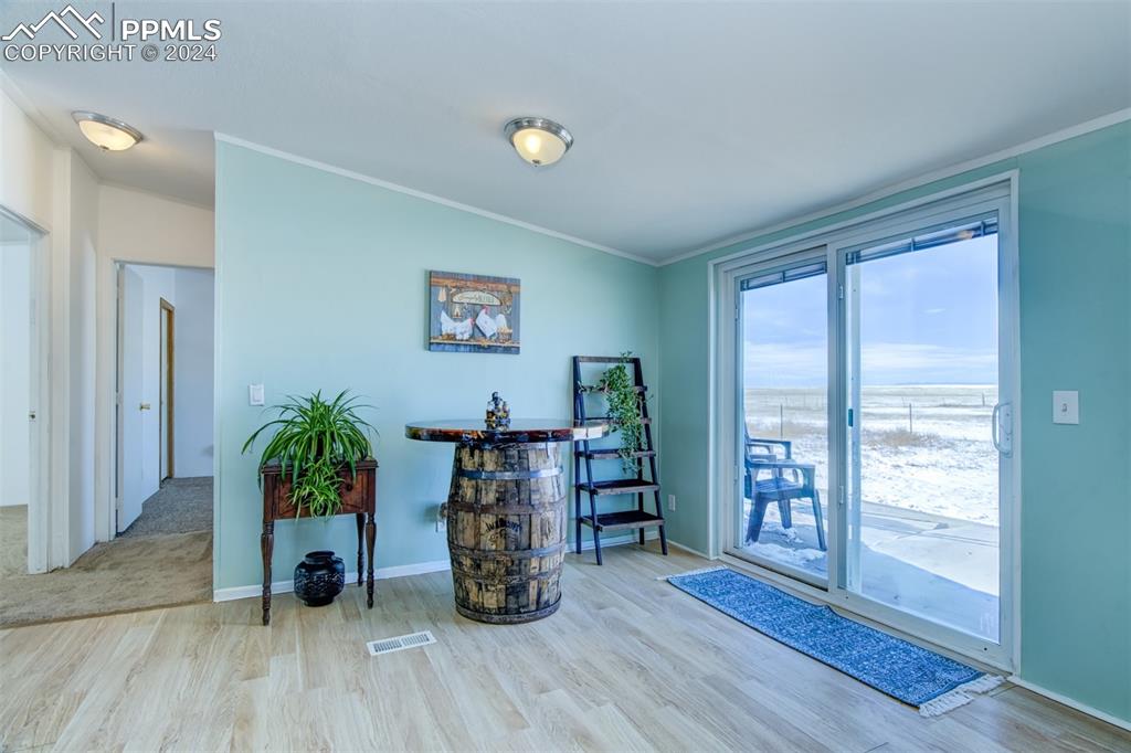 7270 South Yoder Road Yoder, CO 80864 - Photo 10 of 37 a view of livingroom with furniture and wooden floor