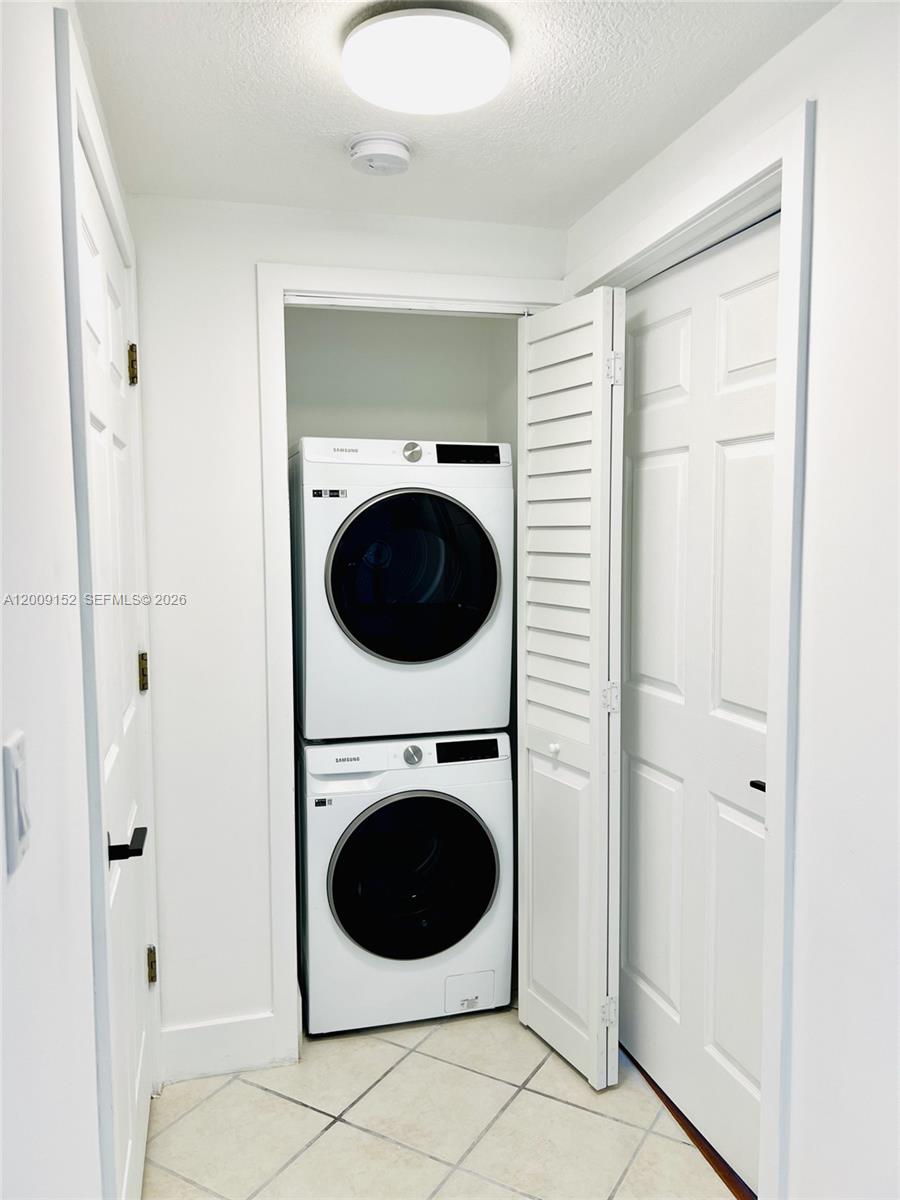 3500 Coral Way, Unit 1102 Miami, FL 33145 - Photo 4 of 8 a utility room with dryer and washer