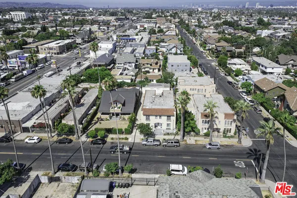 an aerial view of a city with lots of residential buildings