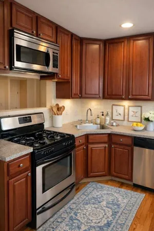 a kitchen with a stove and cabinets