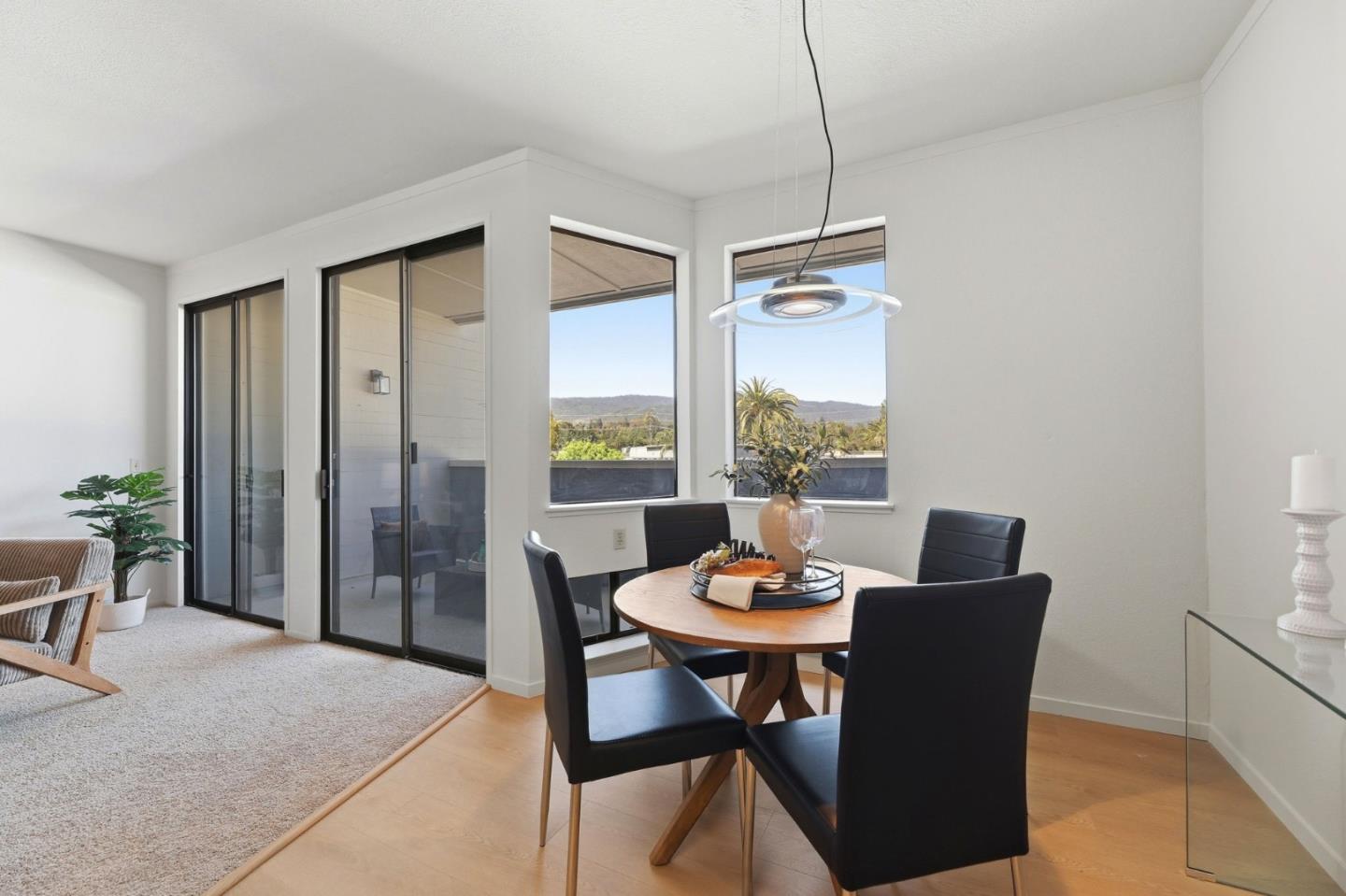 22330 Homestead Road, Unit 226 Cupertino, CA 95014 - Photo 16 of 38 a view of a dining room with furniture window and outside view