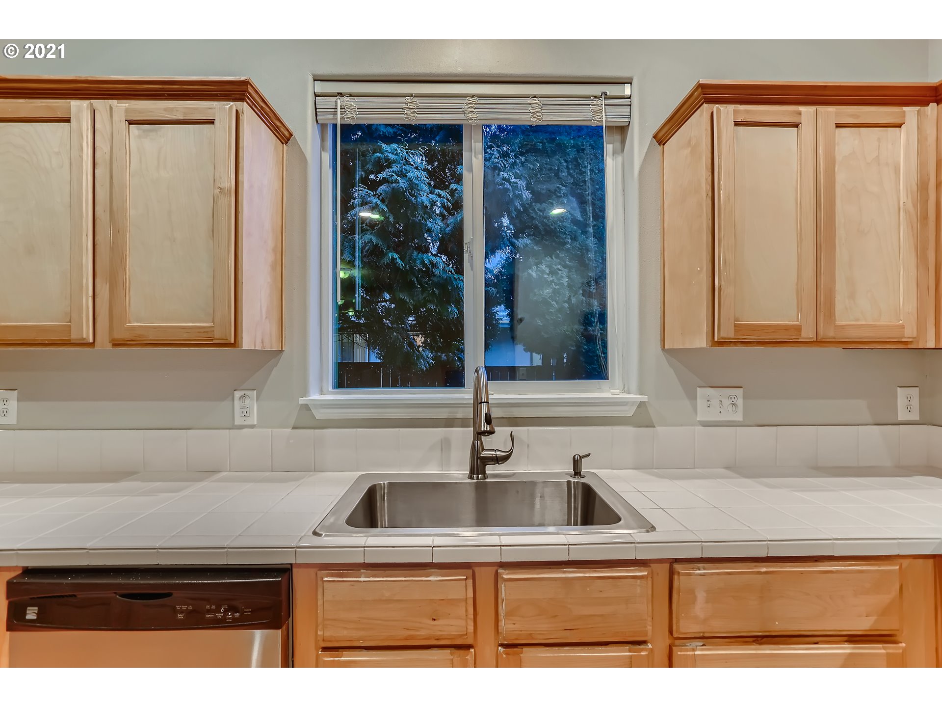 17670 Southwest September Lane Beaverton, OR 97003 - Photo 14 of 31 a kitchen with granite countertop a sink and a window