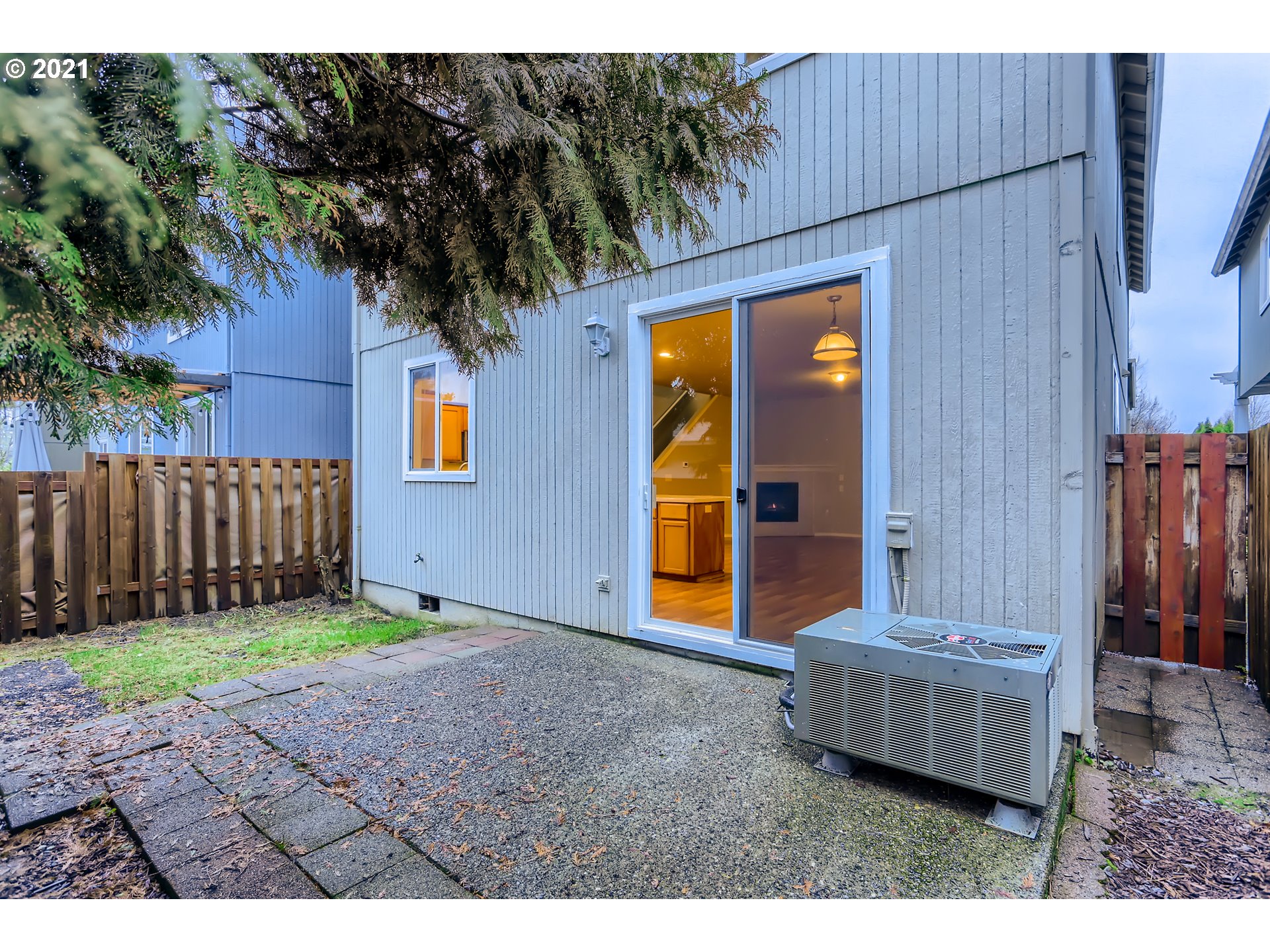 17670 Southwest September Lane Beaverton, OR 97003 - Photo 30 of 31 a backyard of a house with oven a sink and glass door