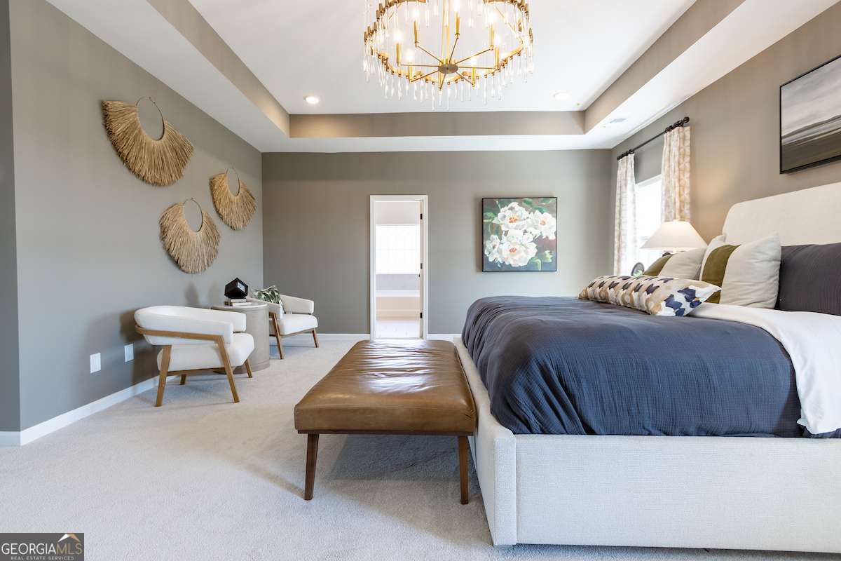 1422 Trellis Court, Unit (LOT 22) Hampton, GA 30228 - Photo 30 of 34 a bedroom with a bed and window