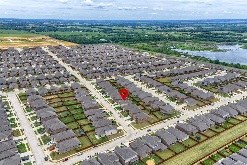 3808 High Country Road Aubrey, TX 76227 - Photo 33 of 36 Aerial perspective highlighting a large residential community