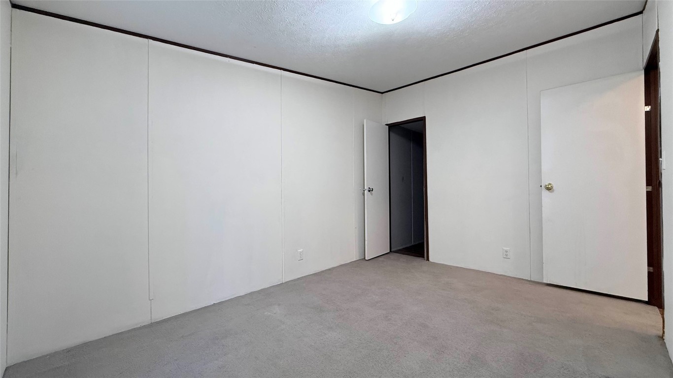 1430 West Howard Lane, Unit 4 Austin, TX 78728 - Photo 11 of 18 a view of an empty room