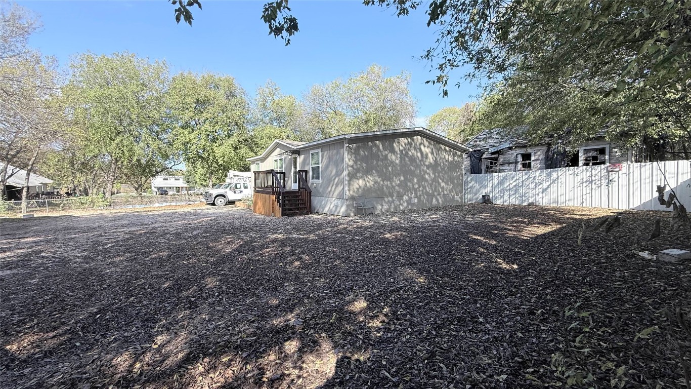 1430 West Howard Lane, Unit 4 Austin, TX 78728 - Photo 17 of 18 a view of a outdoor space with green space