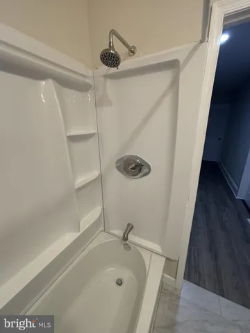 a bathroom with a bathtub