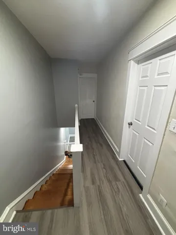 a bathroom with a toilet a sink and bathtub