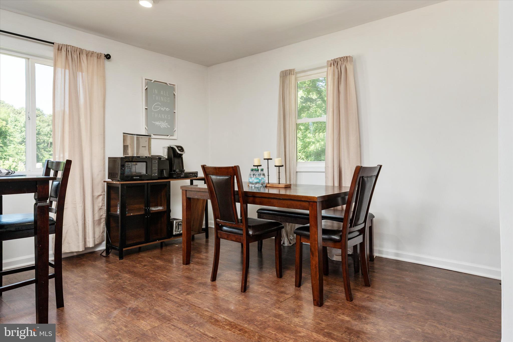 108 Wilson Road Grasonville, MD 21658 - Photo 30 of 38 a view of a dining room with furniture and window