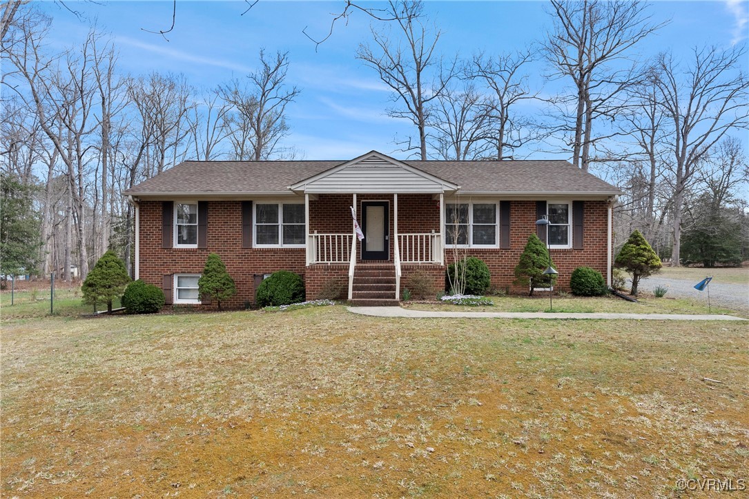9320 Old Forge Road Providence Forge, VA 23140 - Photo 1 of 50 View of front of house featuring a front yard, cov