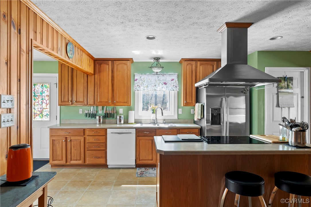 9320 Old Forge Road Providence Forge, VA 23140 - Photo 13 of 50 Kitchen featuring island exhaust hood, dishwasher,