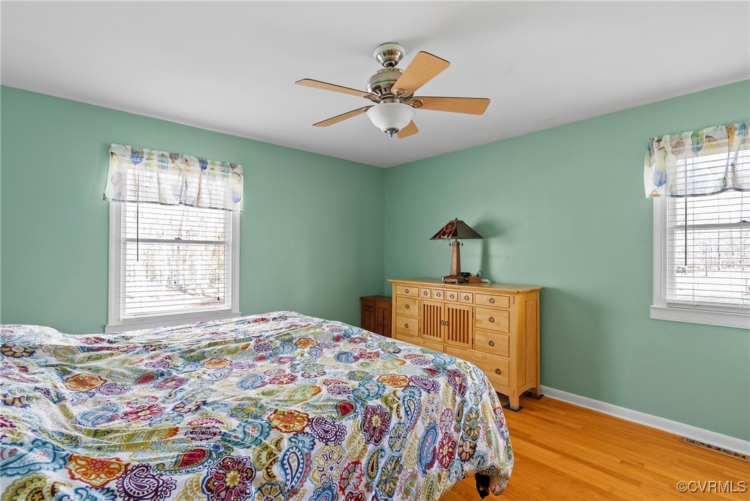 9320 Old Forge Road Providence Forge, VA 23140 - Photo 20 of 50 Bedroom with visible vents, baseboards, light wood