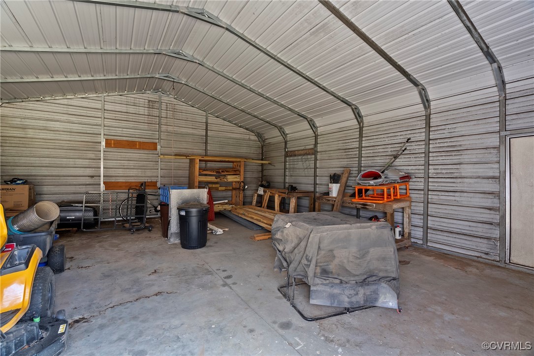9320 Old Forge Road Providence Forge, VA 23140 - Photo 41 of 50 Garage with metal wall