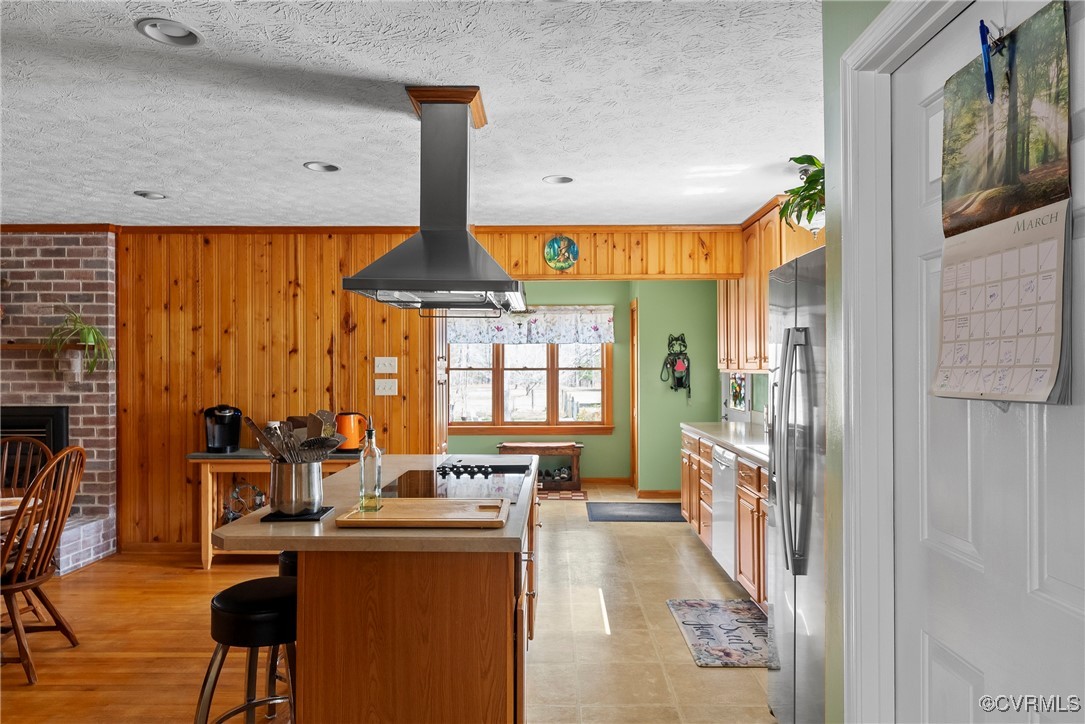 9320 Old Forge Road Providence Forge, VA 23140 - Photo 10 of 50 Kitchen featuring wooden walls, a kitchen breakfas
