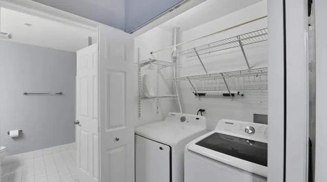 a utility room with dryer and washer