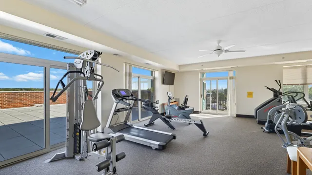 a view of a room with gym equipment