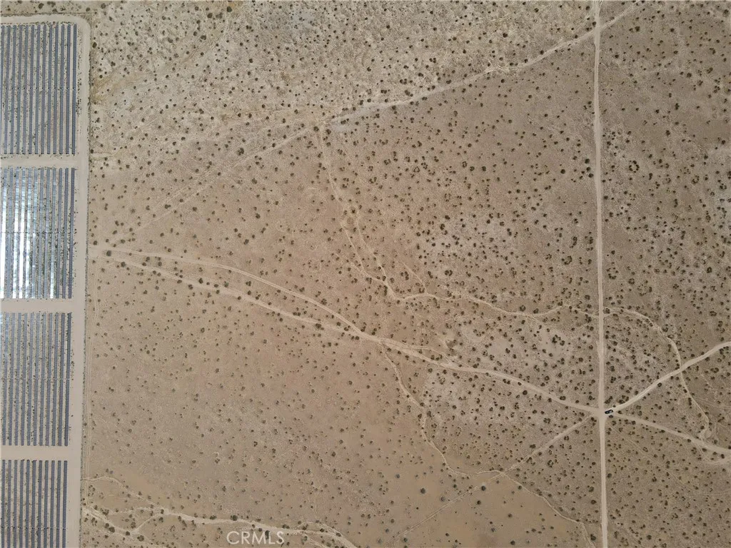 4 Caughlin Road Adelanto, CA 92301 - Photo 5 of 14 a bathroom with a shower