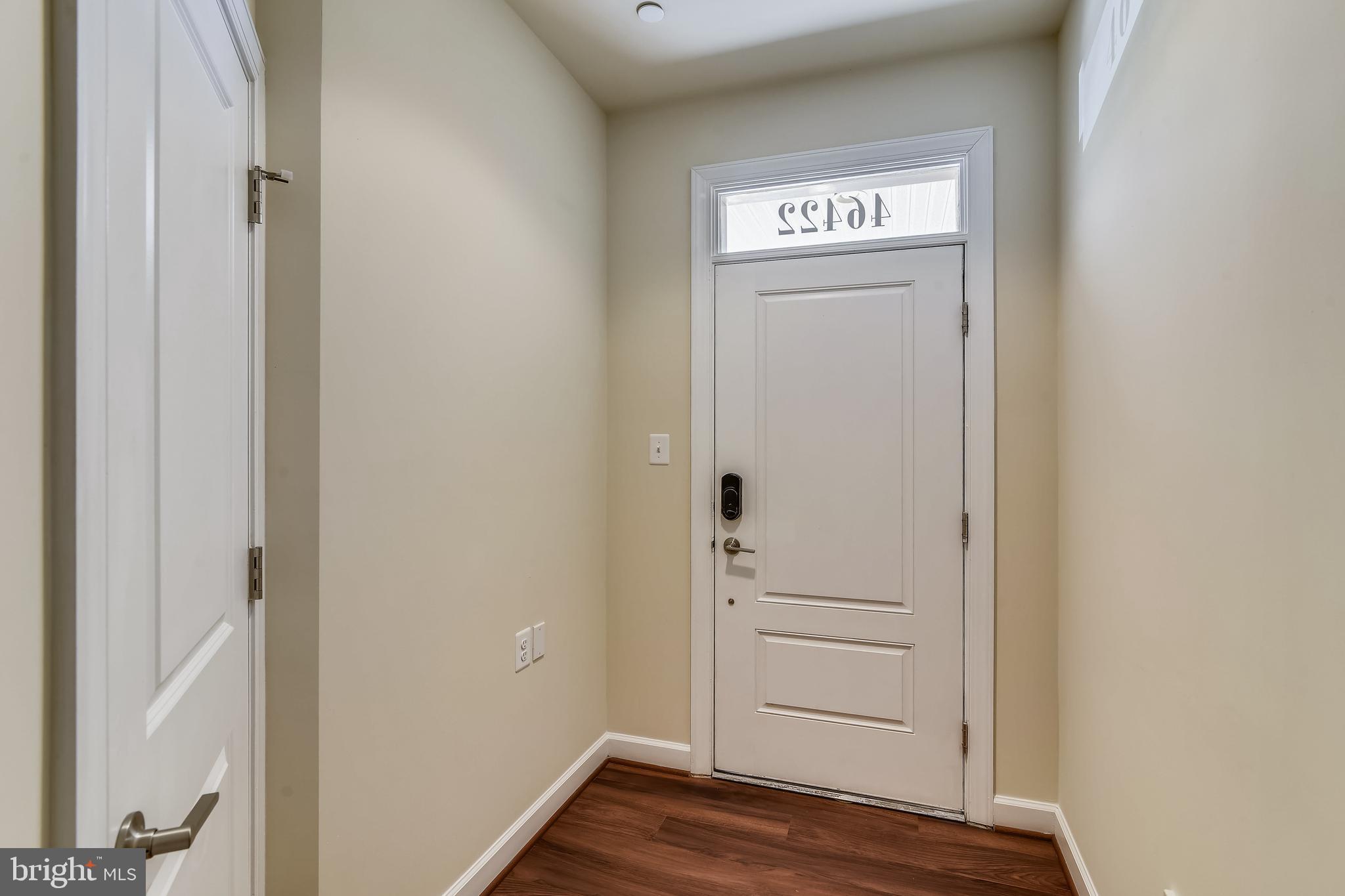 46422 Rilassare Terrace Sterling, VA 20164 - Photo 37 of 42 Lower level entrance foyer