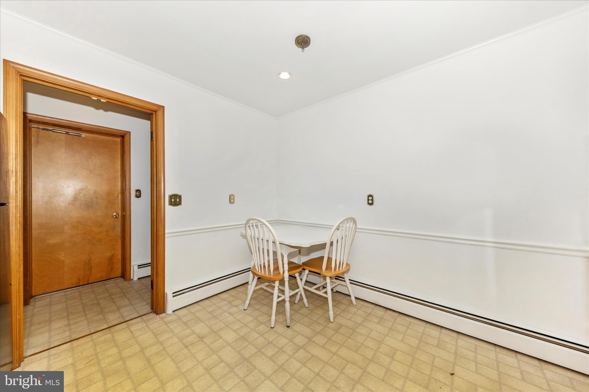 9811 Watkins Road Gaithersburg, MD 20882 - Photo 12 of 54 a view of a dining room with furniture