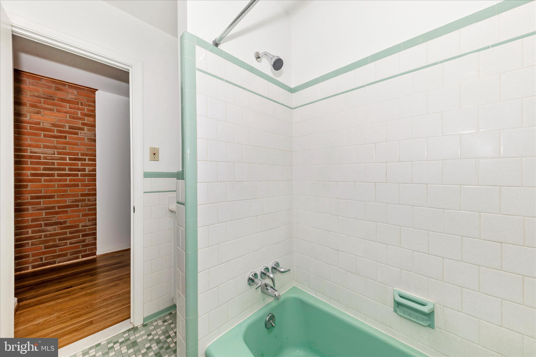 9811 Watkins Road Gaithersburg, MD 20882 - Photo 27 of 54 a bathroom with a shower