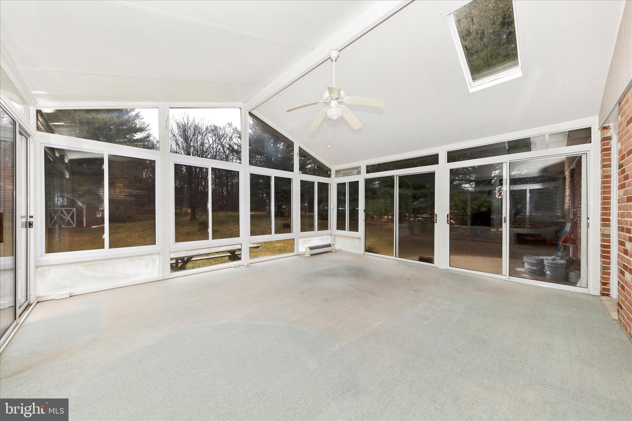 9811 Watkins Road Gaithersburg, MD 20882 - Photo 30 of 54 a view of an house with a large window