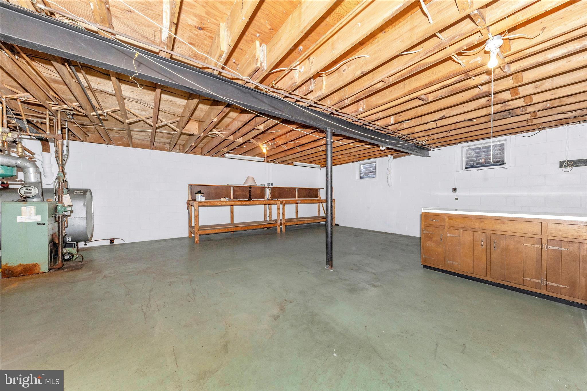 9811 Watkins Road Gaithersburg, MD 20882 - Photo 36 of 54 a view of a room with table and chairs