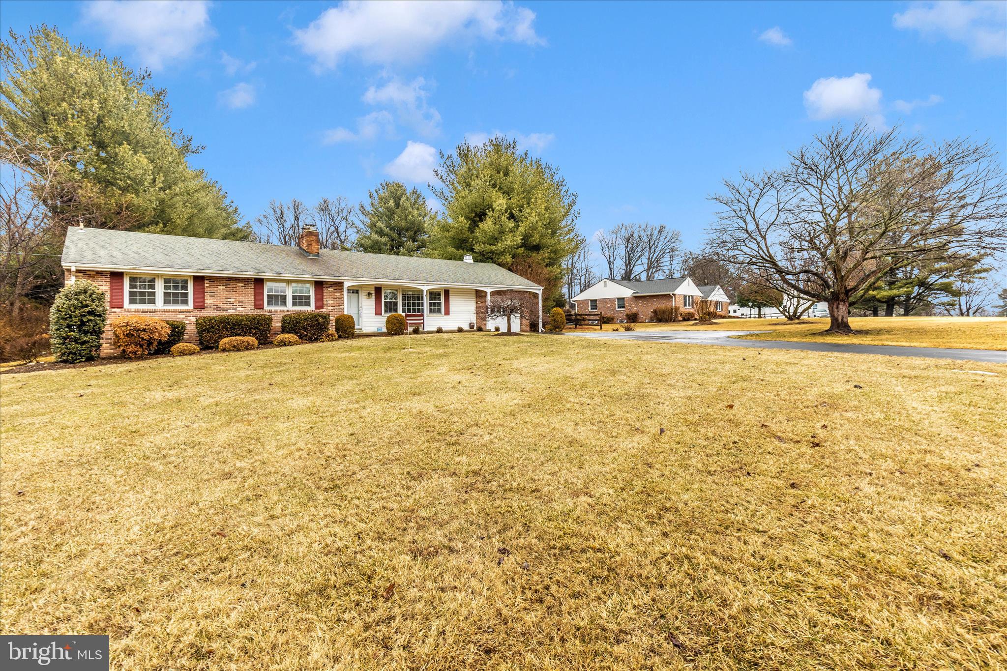 9811 Watkins Road Gaithersburg, MD 20882 - Photo 39 of 54 a view of a house with a yard and swimming pool