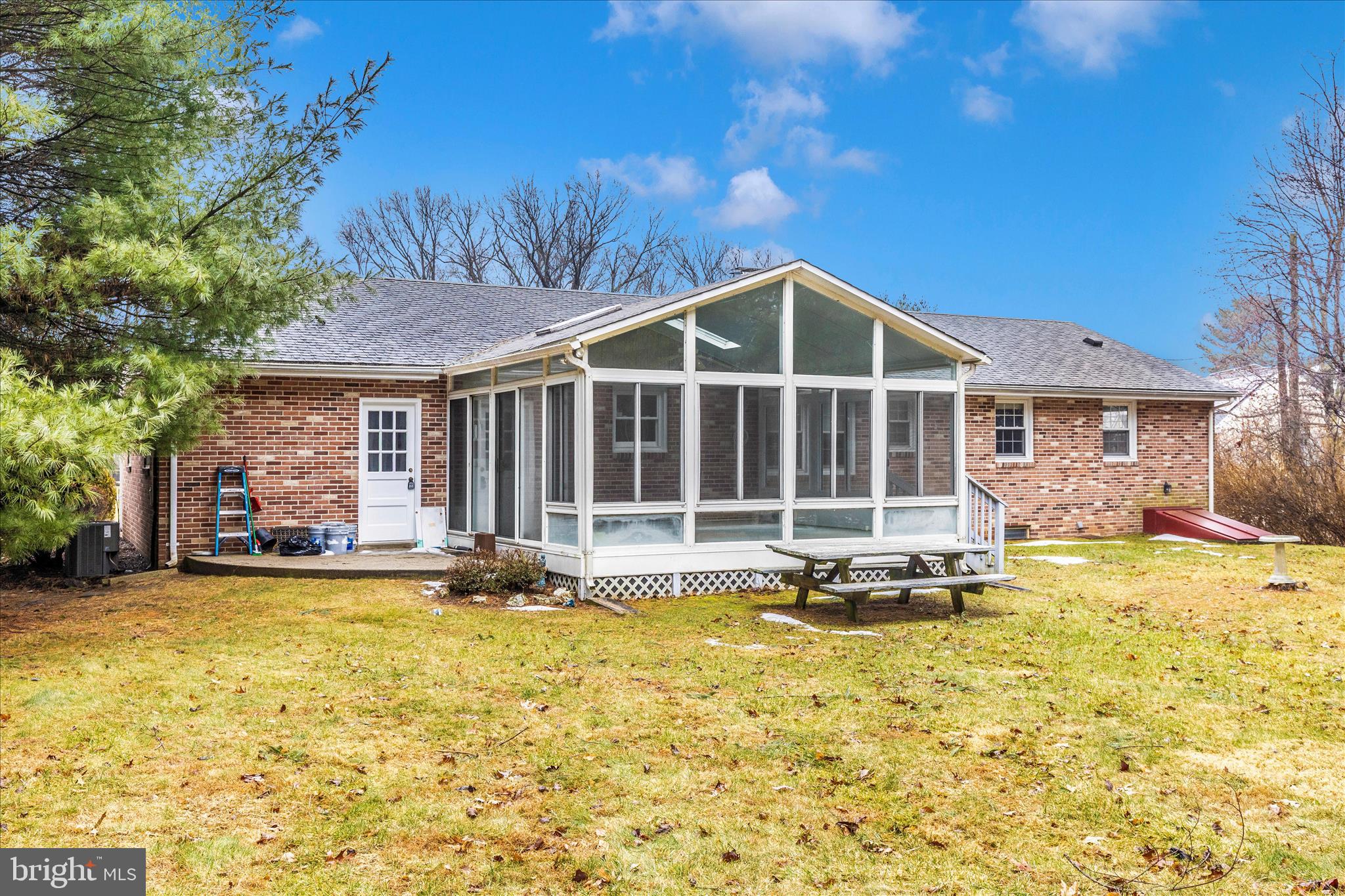 9811 Watkins Road Gaithersburg, MD 20882 - Photo 42 of 54 a view of a house with pool and sitting area