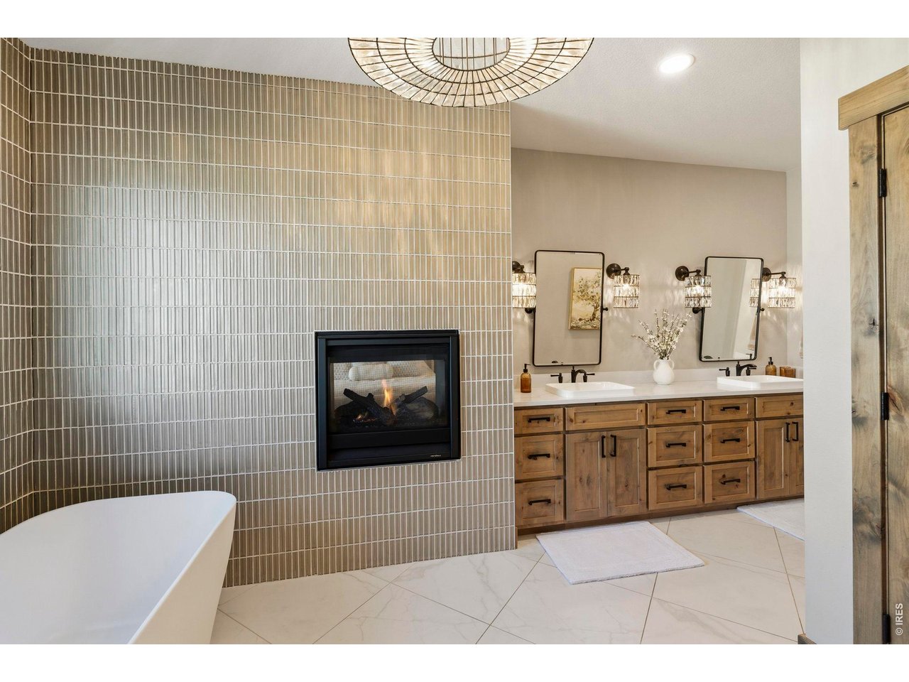 2734 Southwind Road Berthoud, CO 80513 - Photo 24 of 50 Primary 5-piece Bathroom - 2 sided gas fireplace