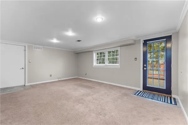 an empty room with windows