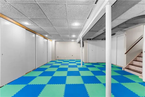 a room with yard and mountain view