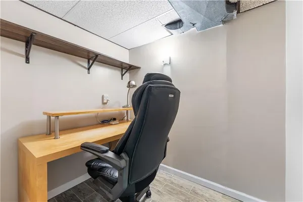 a view of storage and utility room with empty racks
