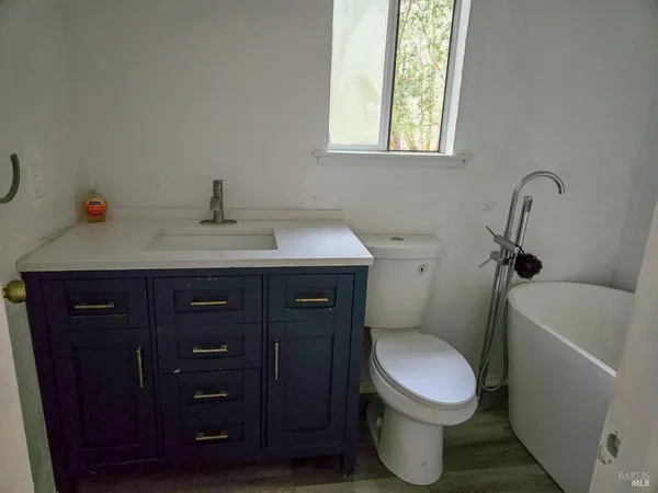 a view of a bathroom with a glass door