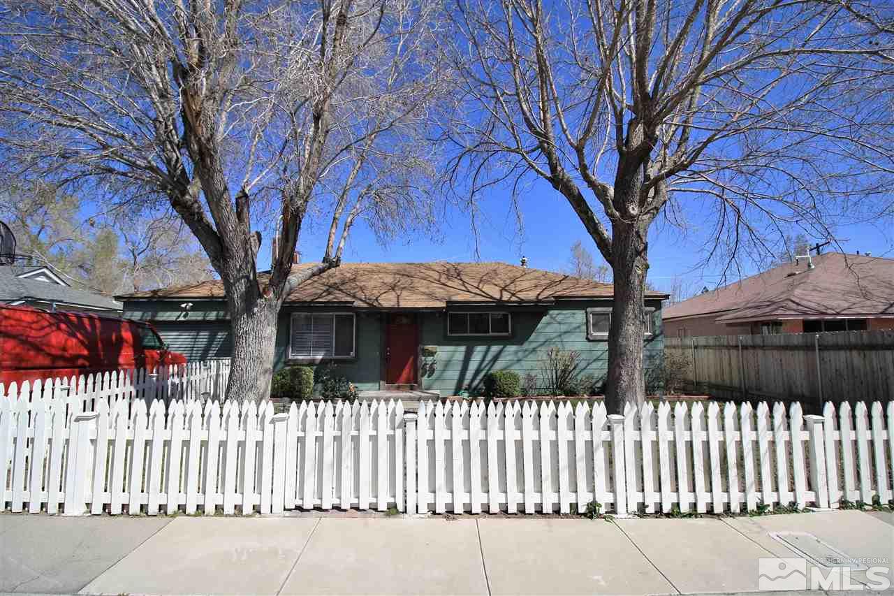 840 Ruby Avenue Reno, NV 89503 - Photo 1 of 1 a view of a house with a wooden fence