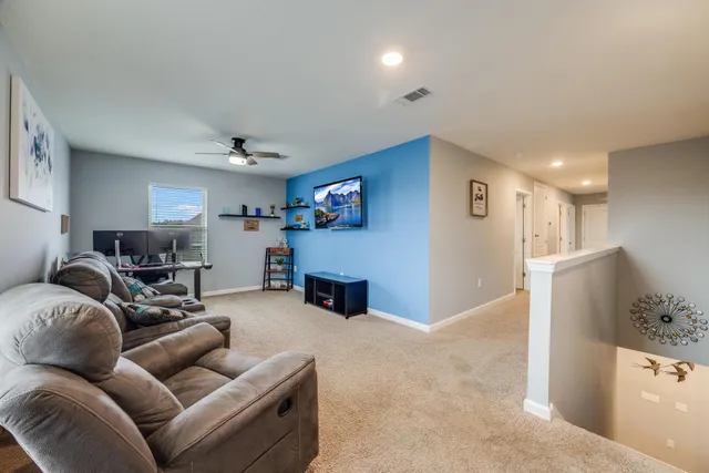 a living room with furniture and a couch