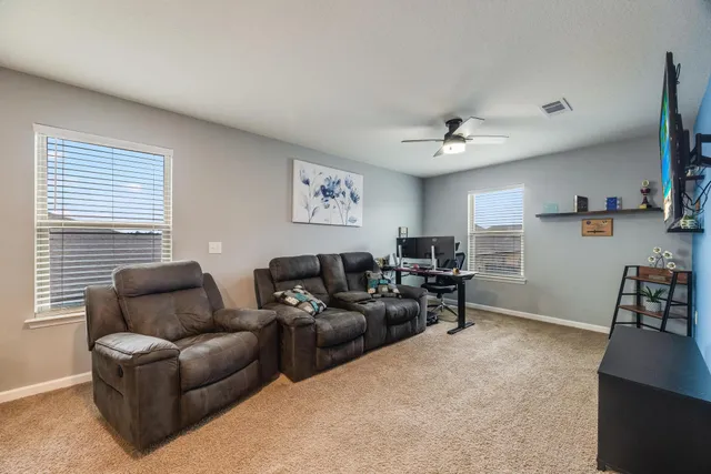 a living room with furniture